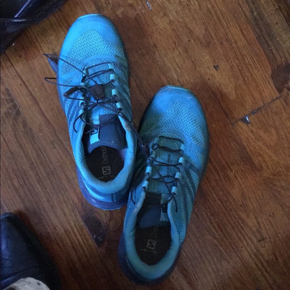 Lightly used teal Salomons